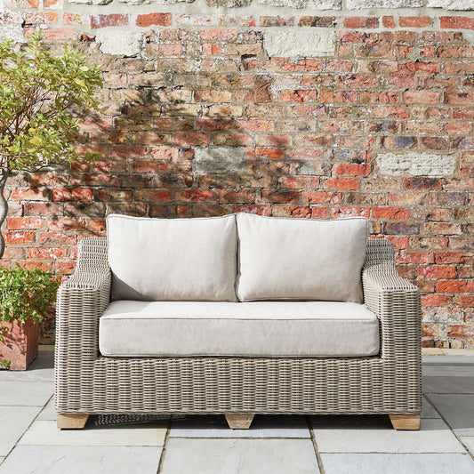 Capri Beige Outdoor Wicker 2-Seater Sofa – Acacia Wood Legs & Weatherproof Cushions