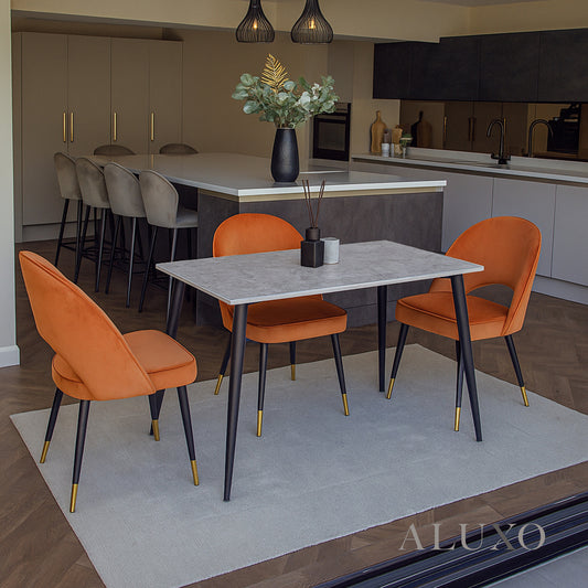 Anders 1.4m Grey Sintered Stone Dining Set – Table with 4/6 Bjorn Rust Velvet Chairs