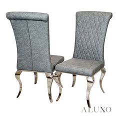 Niklas Grey Faux Leather Dining Chair | Cross Stitch Back, High Scroll Top, Chrome Curved Legs