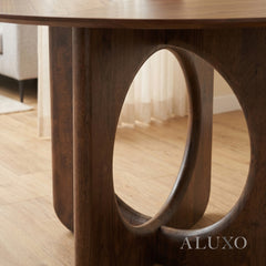 ALUXO® Remy 137cm Round Walnut Dining Table - Ebony Sculptural Base